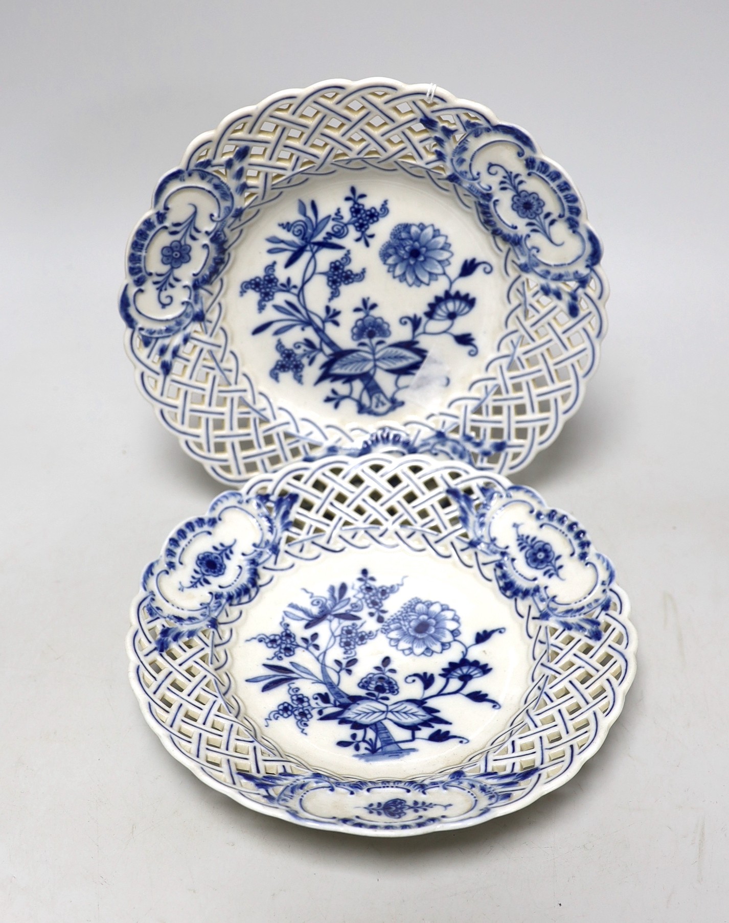 A pair of Meissen Onion pattern blue and white pierced porcelain dishes, 20cm diameter